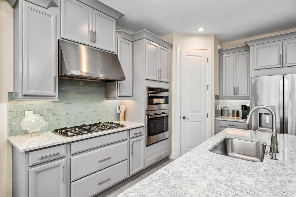 9597 SW Royal Poinciana Drive