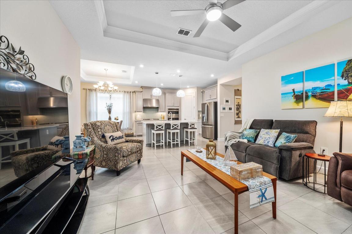 9597 SW Royal Poinciana Drive