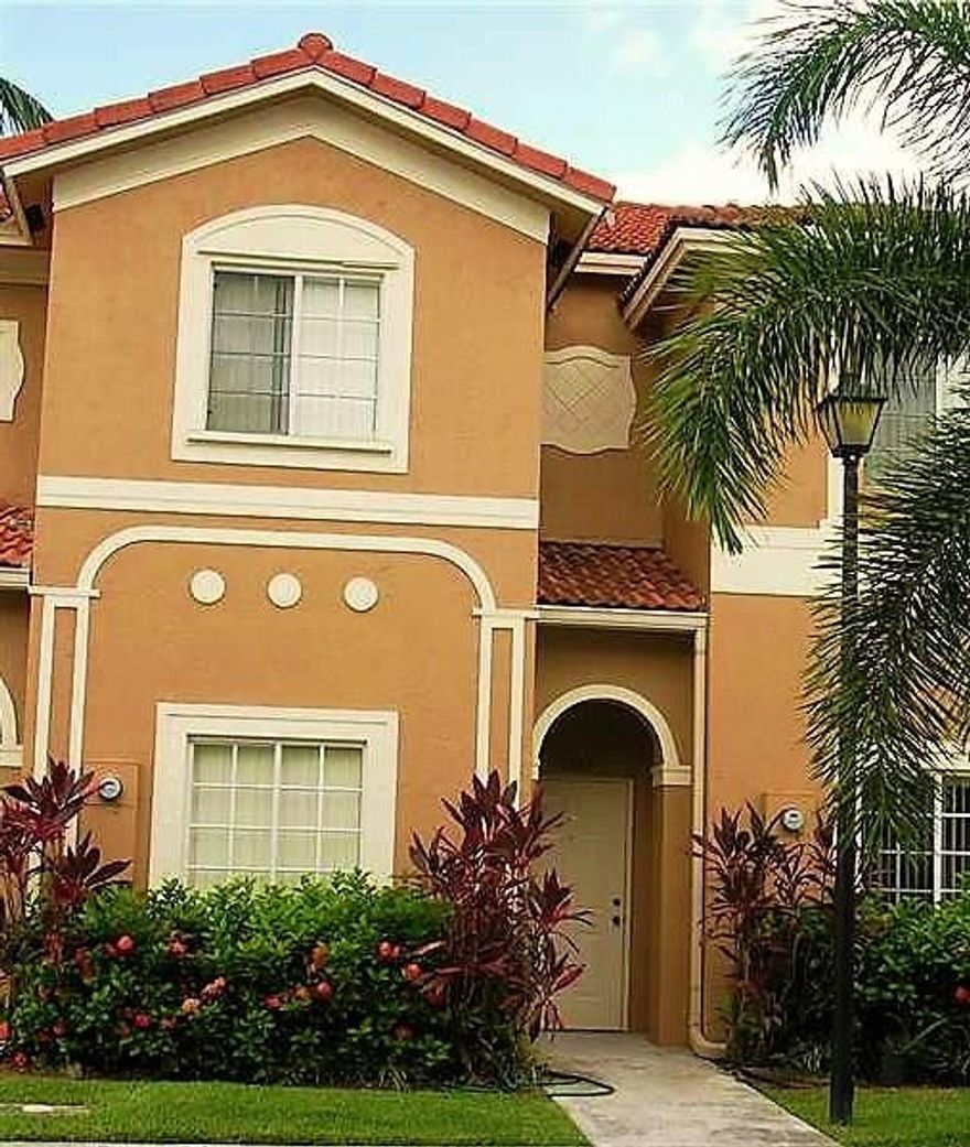 ALL AGES WELCOMED! Beautiful 2 bdrm/2.5 bath Townhouse in "Catalina Lakes". Spacious and open floor plan, Tile throughout 1st floor and Berber carpet in stairs & bdrms. Two (2) Master Bedrooms with private bathrooms. Extended patio tiles. Community Pool, Kids Playground, Centrally located close to highways and The Tamarac Sports Complex. MUST SEE!!!