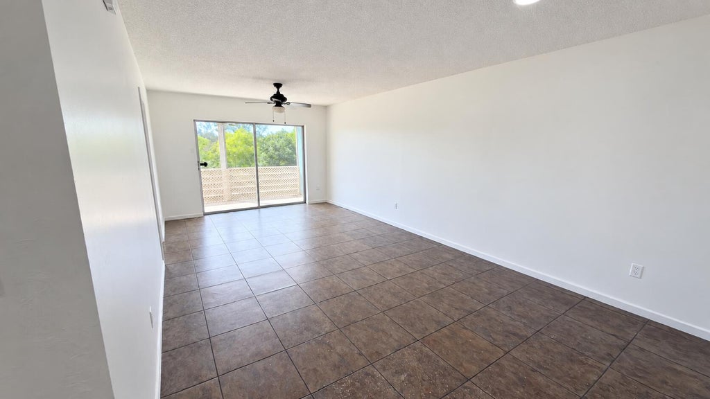 Photo of 4131 STIRLING RD #305, Dania Beach, FL 33314 (MLS # B26076608)