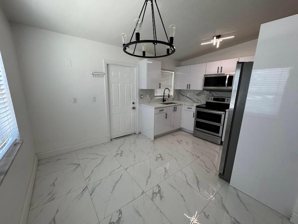 Photo of 508 Palm Avenue #A, Fort Pierce, FL 34982 (MLS # R11140374)