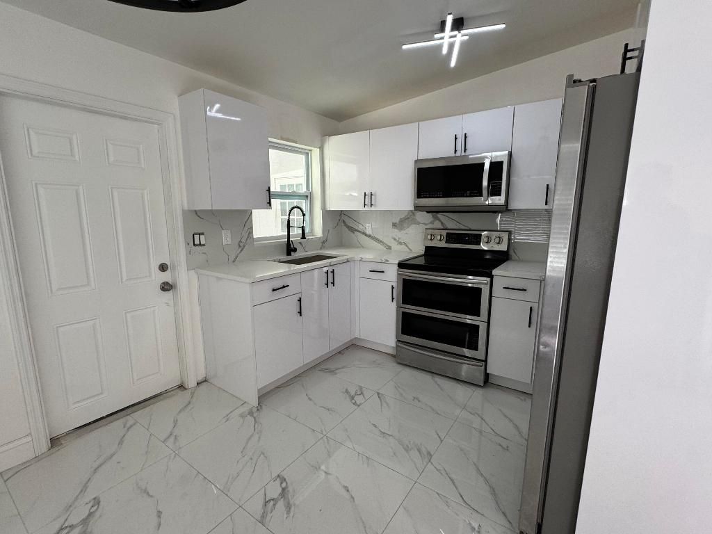 Photo of 508 Palm Avenue #A, Fort Pierce, FL 34982 (MLS # R11140374)