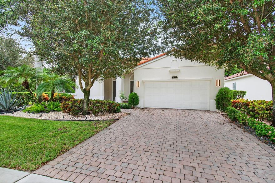 Located in the beautiful Casa Bella community in the city of Delray Beach, 8137 Ferentino Pass invites residents with its impeccable charm and state-of-the-art amenities. Reflective of the vast Florida skies, the elegant exterior is neatly complemented by a generous, large patio, screened and covered for optimal privacy and enjoyment. This outdoor area offers extensive space, perfect for those considering the installation of a pool for endless fun under the sun.The home delivers a significant advantage with a large, two-car garage, providing ample space for vehicle accommodation or additional storage should need arise. As you step inside, the richness of the architectural details can immediately be noticed.