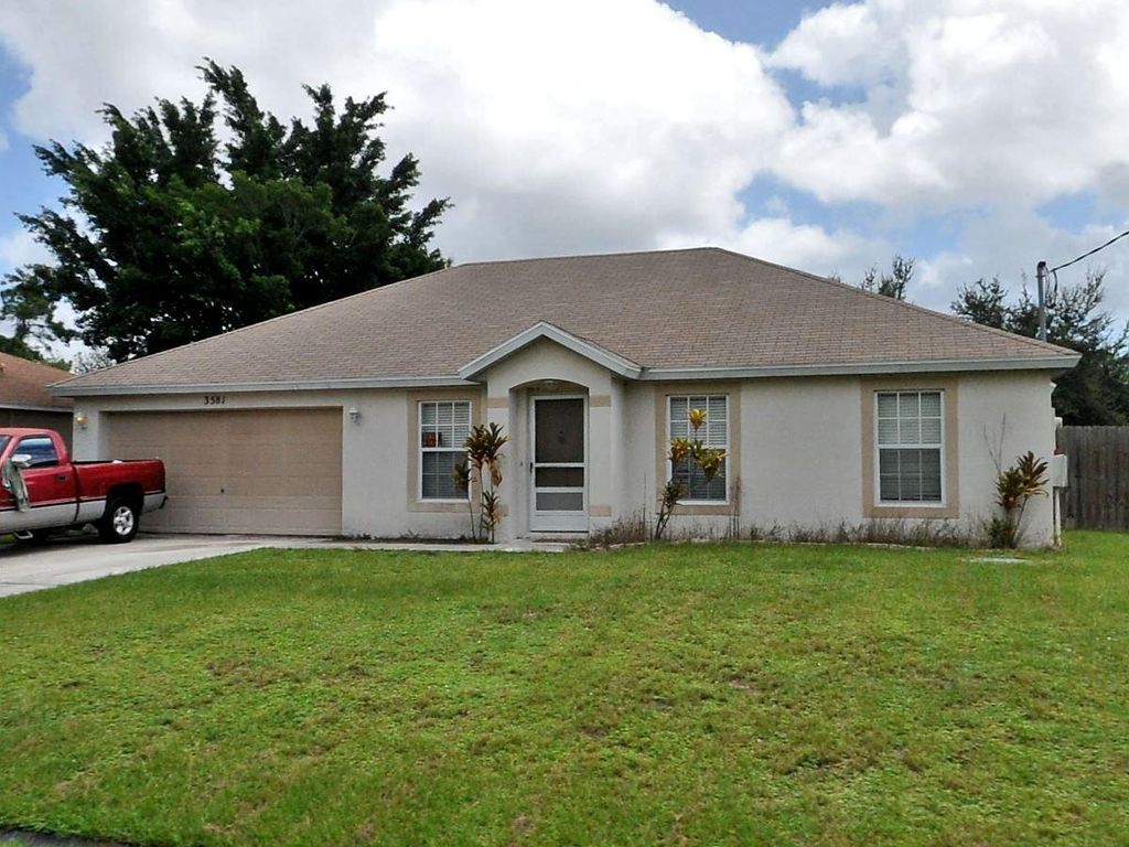 Photo of 3581 SW Kromrey Street, Port Saint Lucie, FL 34953 (MLS # R10816795)