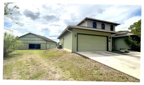 Property photo of 12455 Grumman Way, Port St Lucie, FL 34987