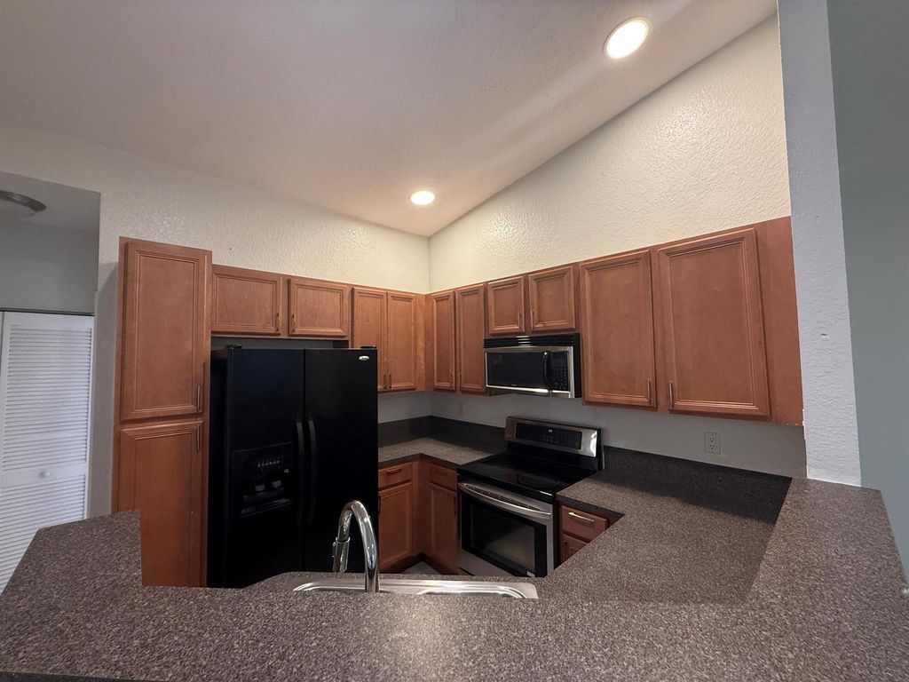 Photo of 3138 Laurel Ridge Circle, Riviera Beach, FL 33404 (MLS # R11138146)