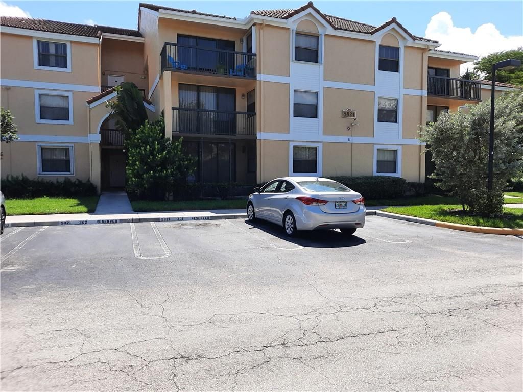 Photo of 5821 Riverside Drive #102, Coral Springs, FL 33067 (MLS # F10314758)