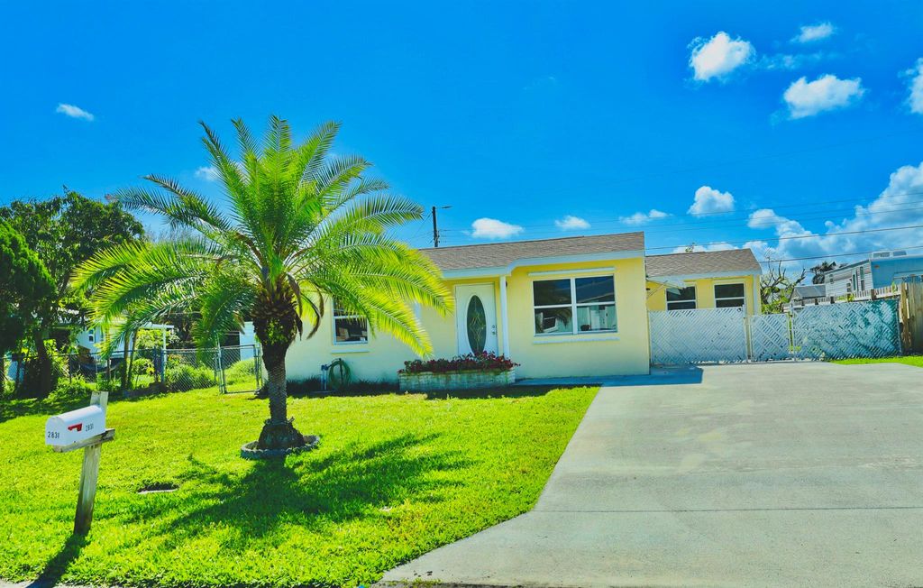 Photo of 2831 Scanlan Avenue, Lake Worth, FL 33461 (MLS # R10937276)