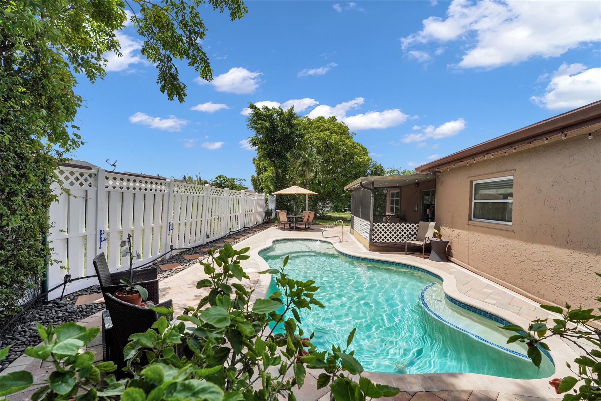 WELCOME TO YOUR CHARMING 3 BEDROOM 2 BATH SALT WATER *POOL* HOME OASIS IN THE DESIRABLE WESTWOOD COMMUNITY OF TAMARAC! IDEAL FOR RELAXING AND ENTERTAINING. THIS HOME IS ALL AGES WITH A LOW HOA. CLOSE TO HIGHWAYS, SCHOOLS, SHOPPING, PARKS, AND RESTUARANTS. THIS HOME IS A MUST SEE. DO NOT MISS THIS OPPORTUITY!!!!FRESHLY PAINTED, UPDATED BARTHROOMS, NEWER APPLIANCES, ROOF 2023, A/C 2016, AND HURRICANE SHUTTERS.
