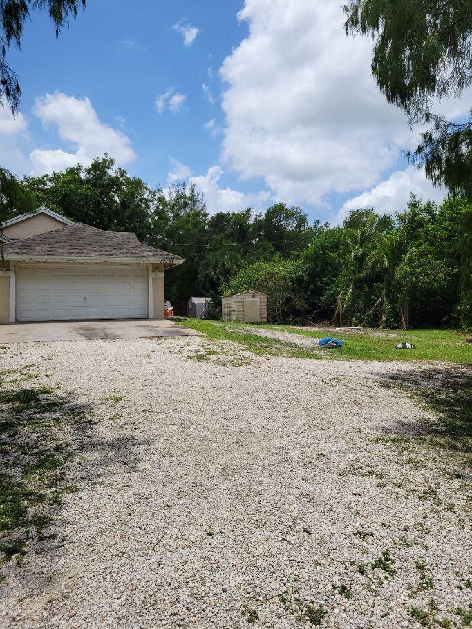 Photo of 17128 30th Lane N, Loxahatchee, FL 33470 (MLS # B26071037)
