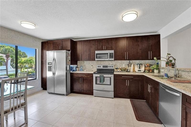 Photo of 7533 Glendevon Lane #907, Delray Beach, FL 33446 (MLS # B26037016)