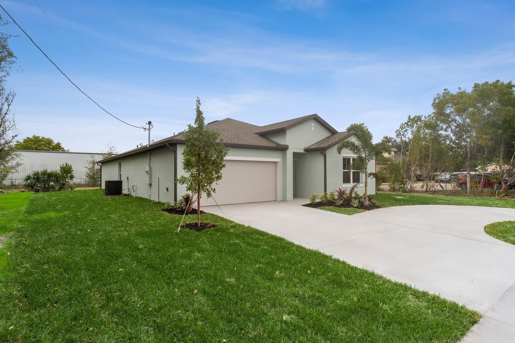 Photo of 1782 SW Bayshore Boulevard, Port Saint Lucie, FL 34984 (MLS # B26007708)