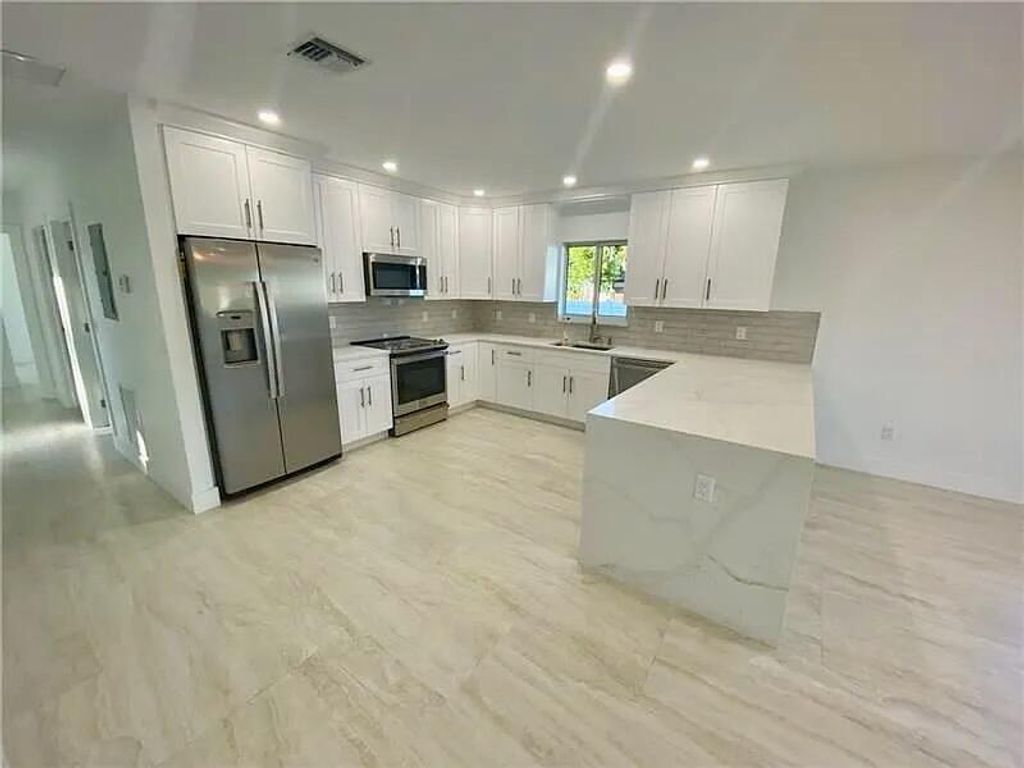 Photo of 2635 NE 17th Street #2635, Pompano Beach, FL 33062 (MLS # B26026851)