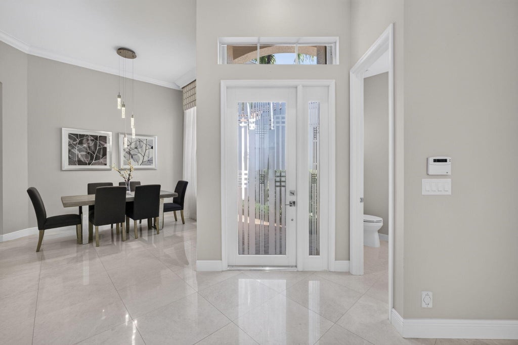 Photo of 114 ANDALUSIA Way, Palm Beach Gardens, FL 33418 (MLS # B26092706)