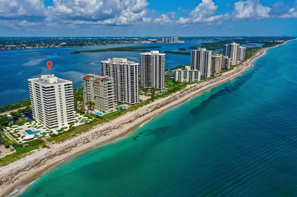 MAGNIFICENT OCEAN AND INTRACOASTAL views from this South facing corner unit on the 16th floor. Only one of two floors in this building with nine-foot ceilings! Custom kitchen cabinetry w/soft touch+oversized island+stainless steel appliances. Crown molding+beautiful oversized ceramic tile in kitchen & main living area+new Maytag W/D w/10 yr warranty. Water views from every room, beautiful west twilight views on sunset. 24 hr manned guard gate+onsite manager+New pool deck+summer kitchen+gorgeous new social room+gym w/ocean view. Reaches is an understated elegant world class building, One of the few BEST KEPT SECRETS on Singer Island. Come and take a look.......