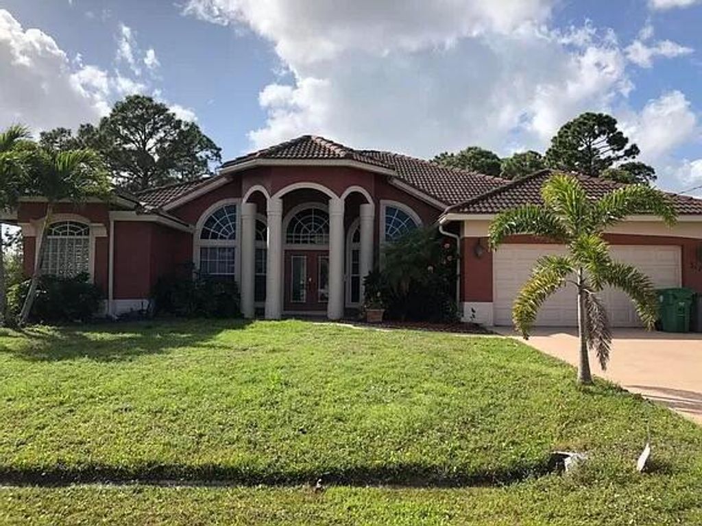 Photo of 3174 SW Fambrough Street, Port Saint Lucie, FL 34953 (MLS # R11018850)
