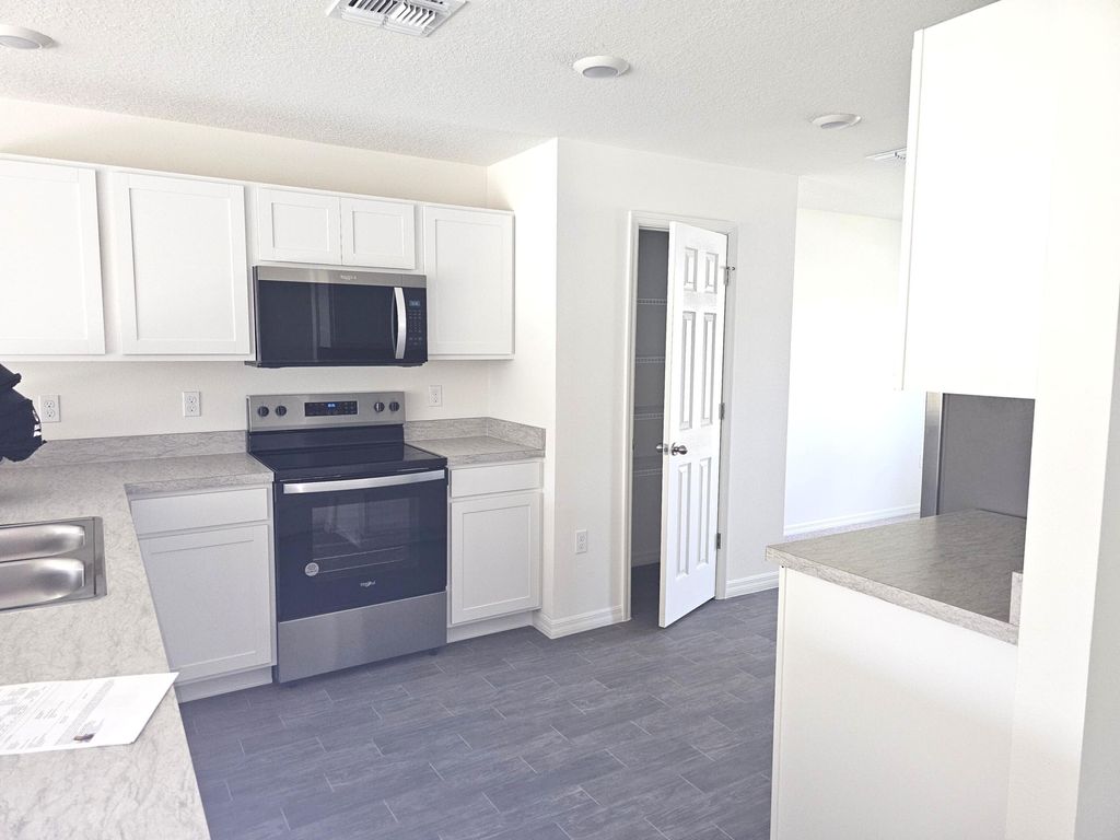 Photo of 3681 SW Haines Street, Port Saint Lucie, FL 34953 (MLS # R11163219)