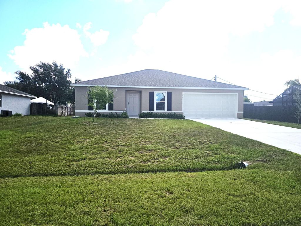 Photo of 3681 SW Haines Street, Port Saint Lucie, FL 34953 (MLS # R11163219)