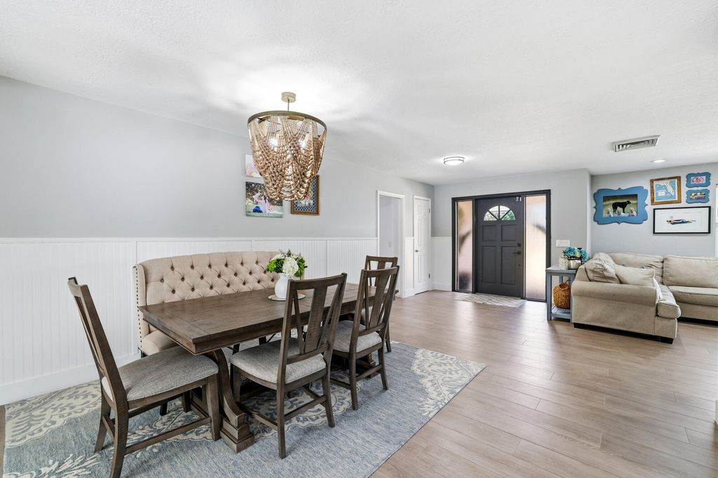 Photo of 624 Whippoorwill Row, West Palm Beach, FL 33411 (MLS # R11164394)