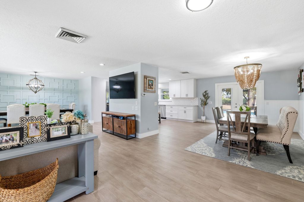 Photo of 624 Whippoorwill Row, West Palm Beach, FL 33411 (MLS # R11164394)