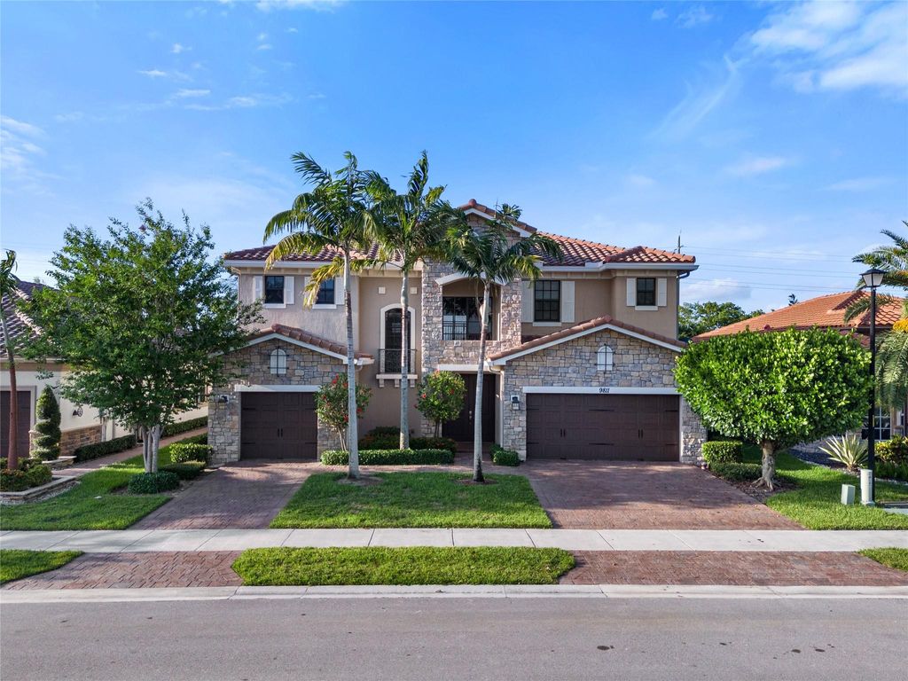 Photo of 9811 Lakeview Ln, Parkland, FL 33076 (MLS # F10523363)