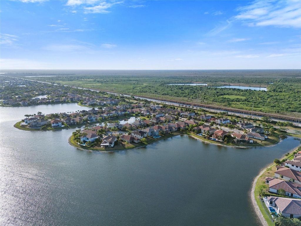 Photo of 9811 Lakeview Ln, Parkland, FL 33076 (MLS # F10523363)