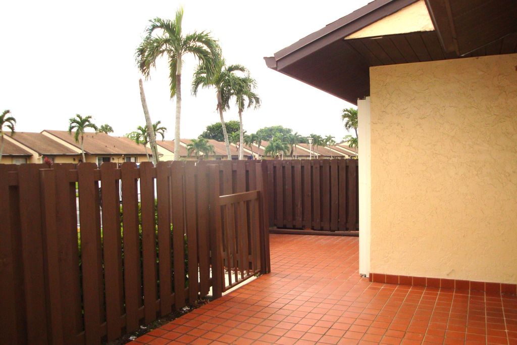 Photo of 803 Sky Pine Way #F, Greenacres, FL 33415 (MLS # B26008331)