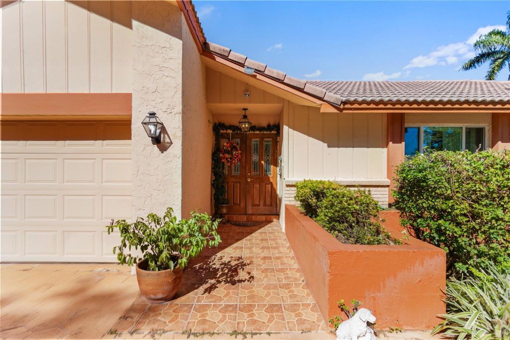 Photo of 10731 NW 17th St, Coral Springs, FL 33071 (MLS # F10534835)