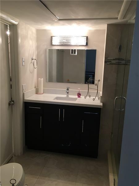 Tile floors throughout. Impact Windows. Stainless appliances and quartz countertops in the kitchen. Walk In Shower. Great 55 plus complex close to Wilton Manors. Blocks from I95....just a few miles to the beach. Oakland Grove Village is a very nice well maintained property.