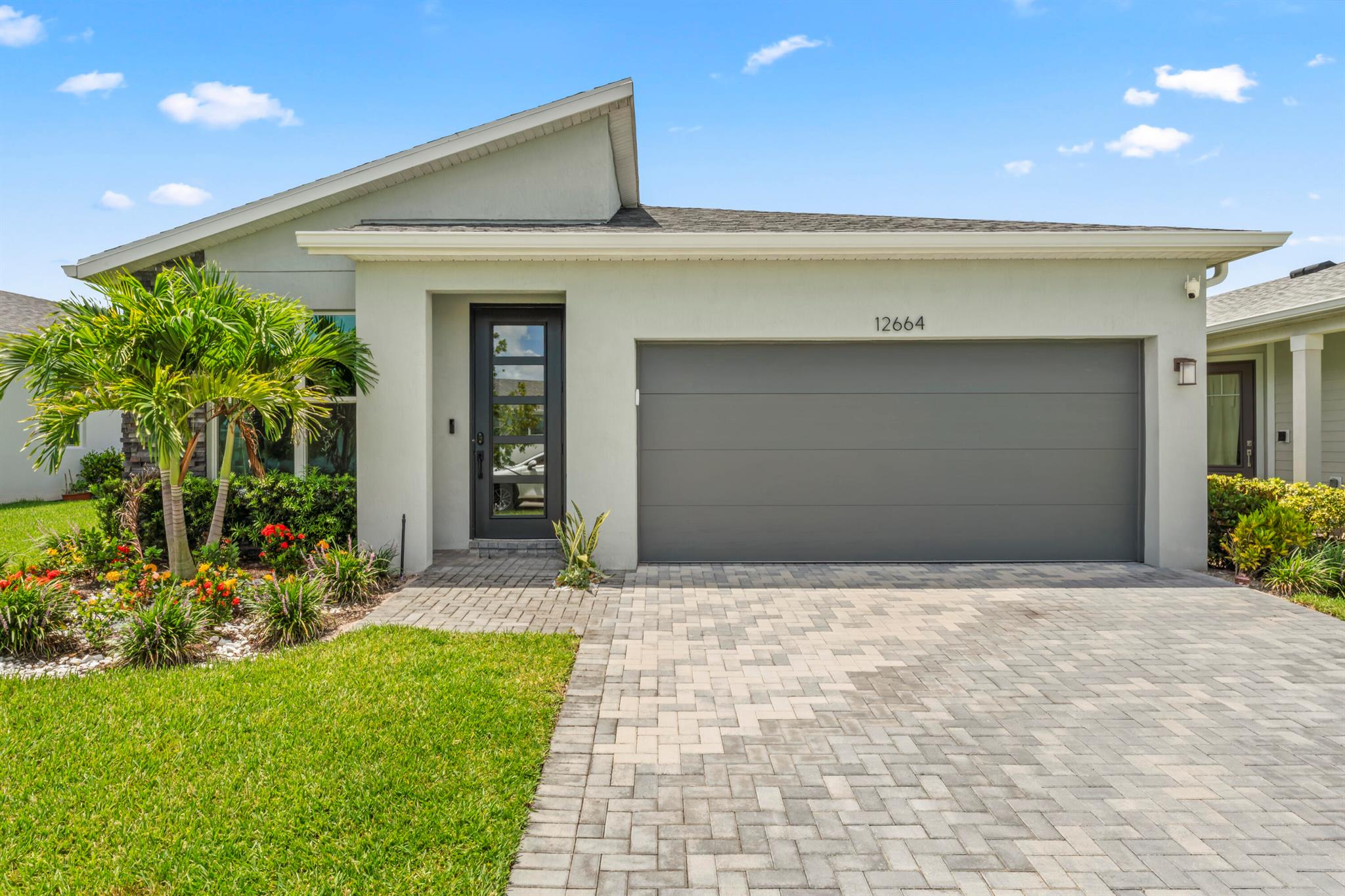 Take advantage of seller-paid concessions! Great opportunity Welcome to 12664 SW Eleanor Drive, located in the highly sought-after community of Tradition in Port St. Lucie. This 3-bedroom, 2.5-bath home plus a flex room offers nearly 2,000 sq ft of living space with an open-concept layout, tile all throughout, and a spacious kitchen with stainless steel appliances. Built in 2023, the home features CBS construction, a 2-car garage, and a well-designed split floor plan. The primary suite includes a walk-in closet and en-suite bathroom with dual sinks and a walk-in shower.Enjoy resort-style living with access to the community pool, clubhouse, fitness center, and more.