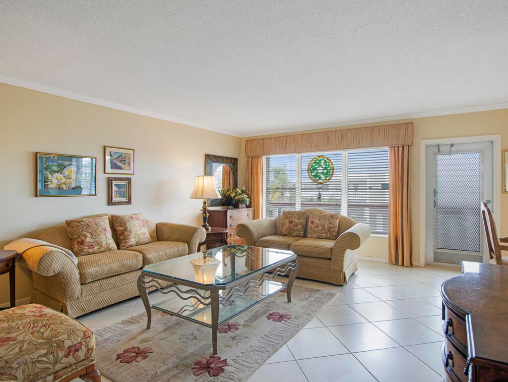 Photo of 305 Wellington D Cir, West Palm Beach, FL 33417 (MLS # B26012030)