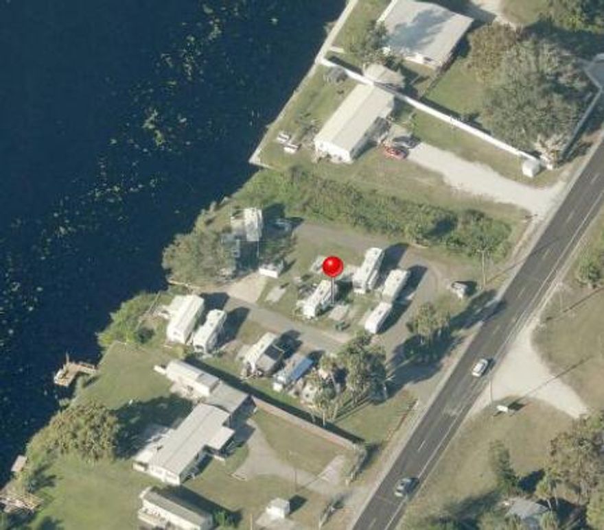 Rental~Waterfront RV Park with Lots($650/mo) & RVs(Different prices)! Prime location directly on Hwy 441 for easy communing and excellent visibility. Property features a private boat ramp with direct access to the Rim Canal, leading to Lake Okeechobee and ocean access. Perfect for boating and fishing enthusiasts. Conveniently located near local stores, gas stations, restaurants, churches and everyday essentials. School bus transportation available for children and situated near great schools. Laundry facility access. An excellent opportunity for seasonal or long term residents seeking waterfront living with unbeatable comfort.