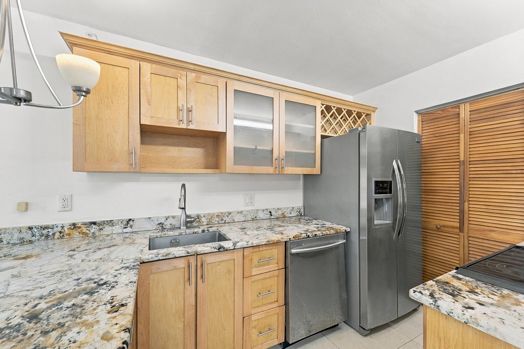 Photo of 2907 NE 8TH Terrace #201, Oakland Park, FL 33334 (MLS # B26094800)