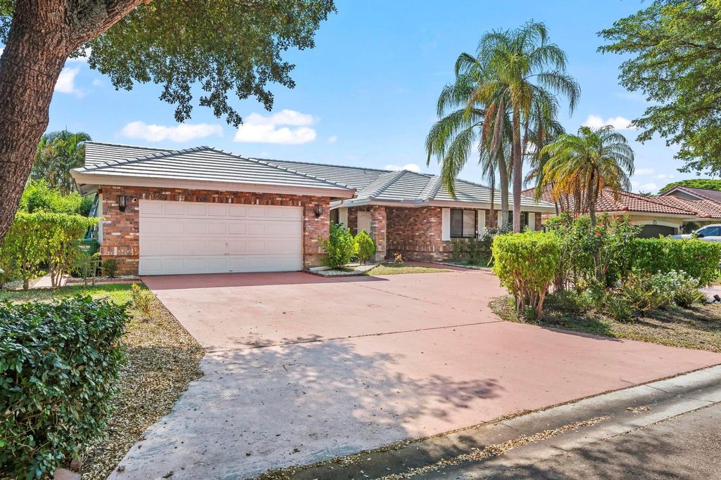 Photo of 4664 NW 58th Terrace, Coral Springs, FL 33067 (MLS # F10552137)