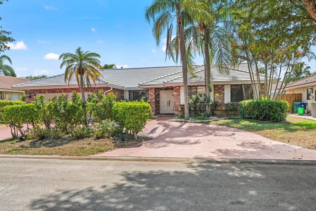 Photo of 4664 NW 58th Terrace, Coral Springs, FL 33067 (MLS # F10552137)