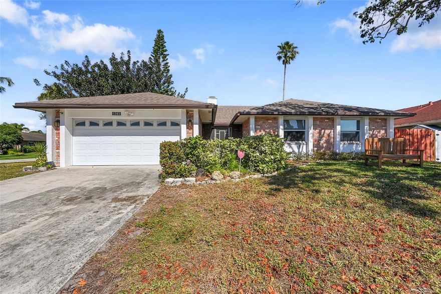 Welcome to this charming 3-bedroom, 2-bath pool home in the heart of Deerfield Beach. It offers a perfect blend of character and comfort. This unique property features an amazing layout with a rare dual-sided fireplace enjoyed from both the family room and the eat-in kitchen—perfect for cozy evenings or entertaining guests. The spacious kitchen offers granite countertops, stainless steel appliances, and ample cabinetry. Vaulted ceilings with skylights fill the home with natural light, creating an open and airy feel throughout. Step outside to a long, sparkling pool and screened-in patio—perfect for relaxing or entertaining. Ideal for year-round Florida living. Conveniently located with easy access to shopping, dining, and major highways.