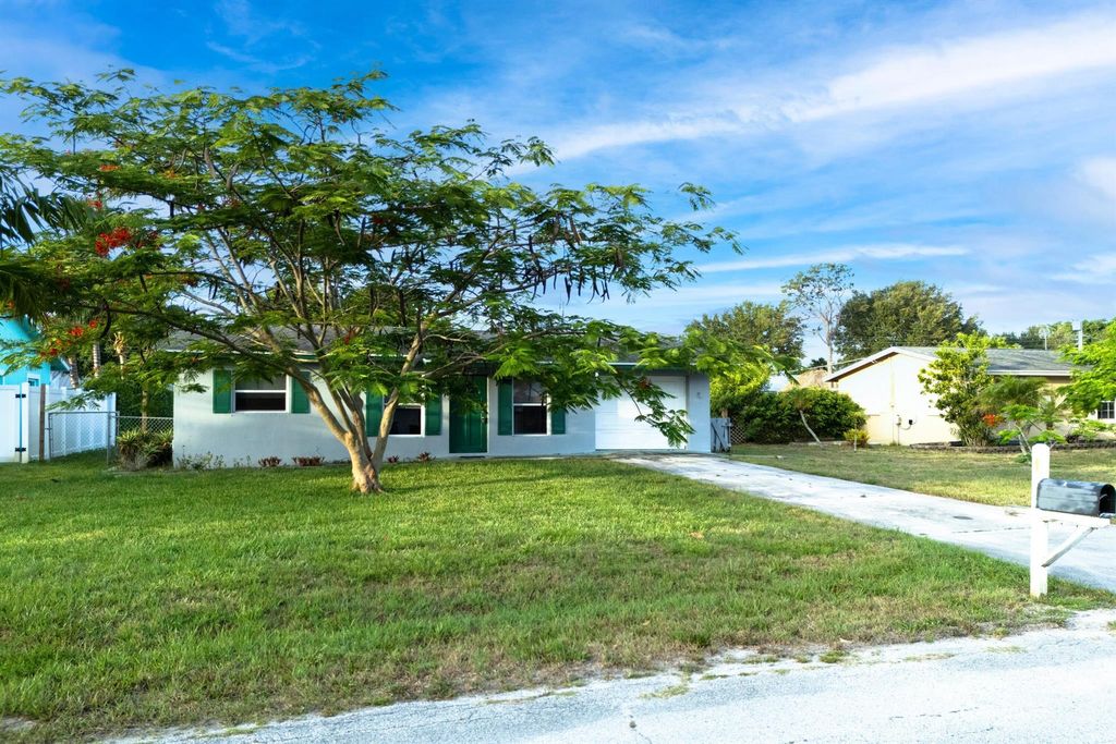 Photo of 1144 NE Crown Terrace, Jensen Beach, FL 34957 (MLS # R11091288)