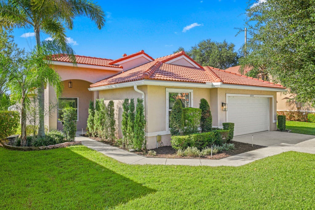 Photo of 6324 BARTON CREEK Circle, Lake Worth, FL 33463 (MLS # B26088625)