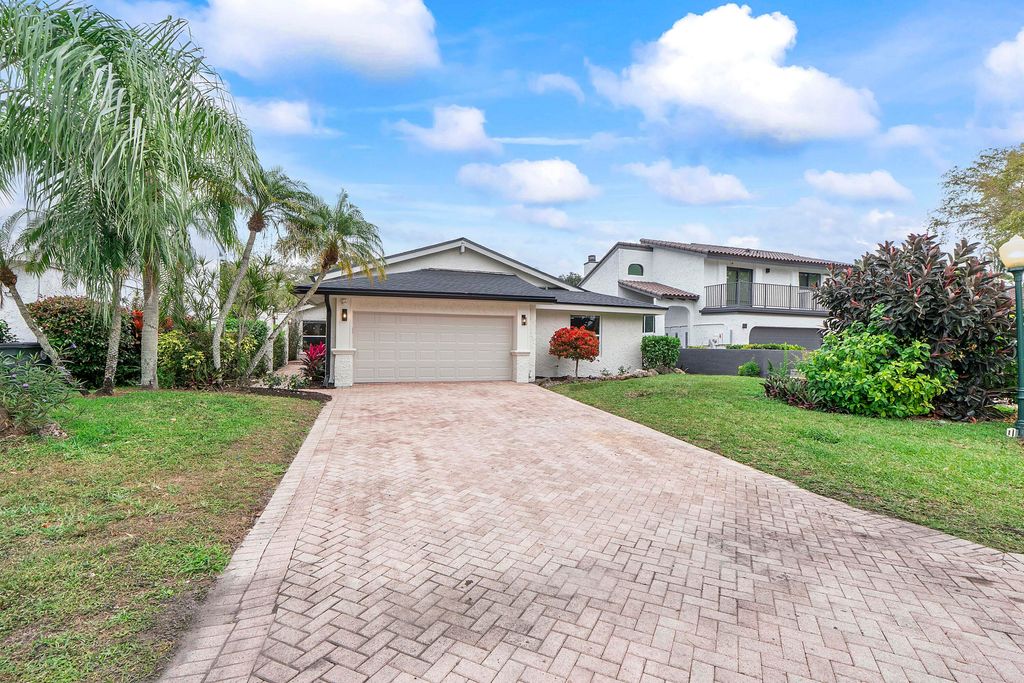Photo of 6443 Pond Apple Road, Boca Raton, FL 33433 (MLS # R11159522)