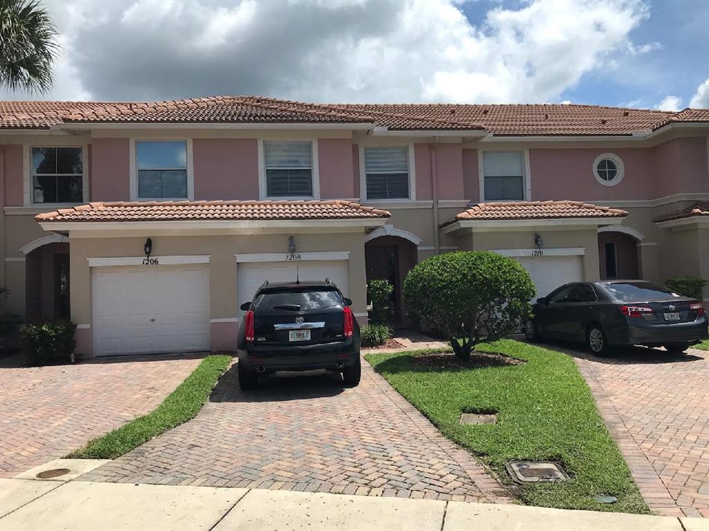 Nice Townhouse in a desirable neighborhood. Completely repainted with new flooring. Ready to move-in. Security Alarm, Garage Door Opener and Trash pick-up included. Screen Patio, Upgraded fixtures, sinks and tubs, Cul-de-sac community with swimming pool.