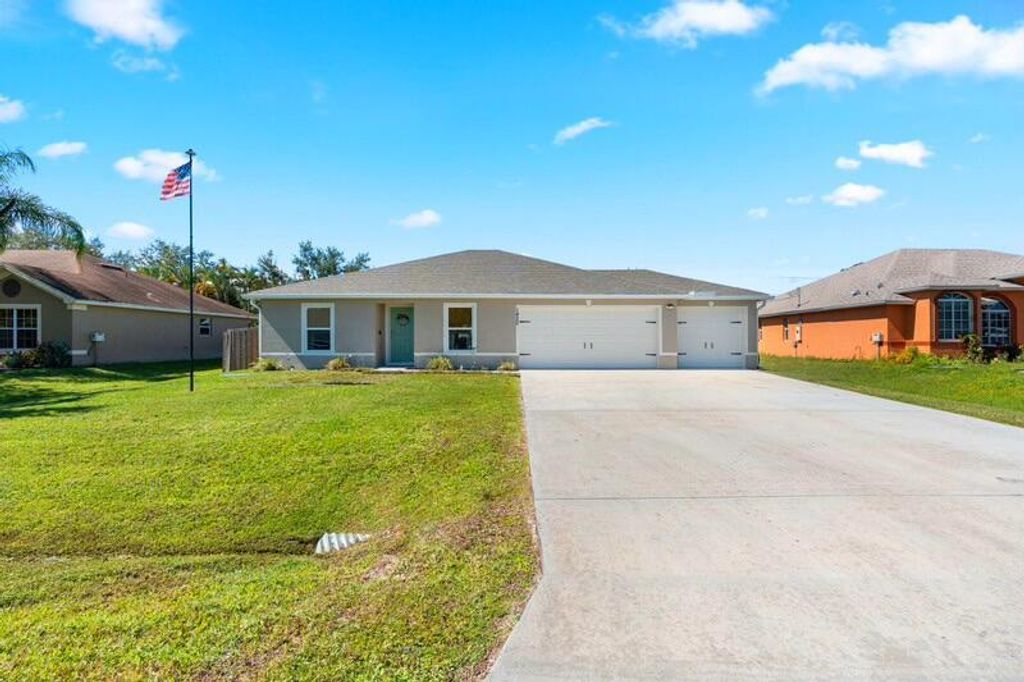 Photo of 1420 SE O'Donnell Lane, Port Saint Lucie, FL 34983 (MLS # R11133690)
