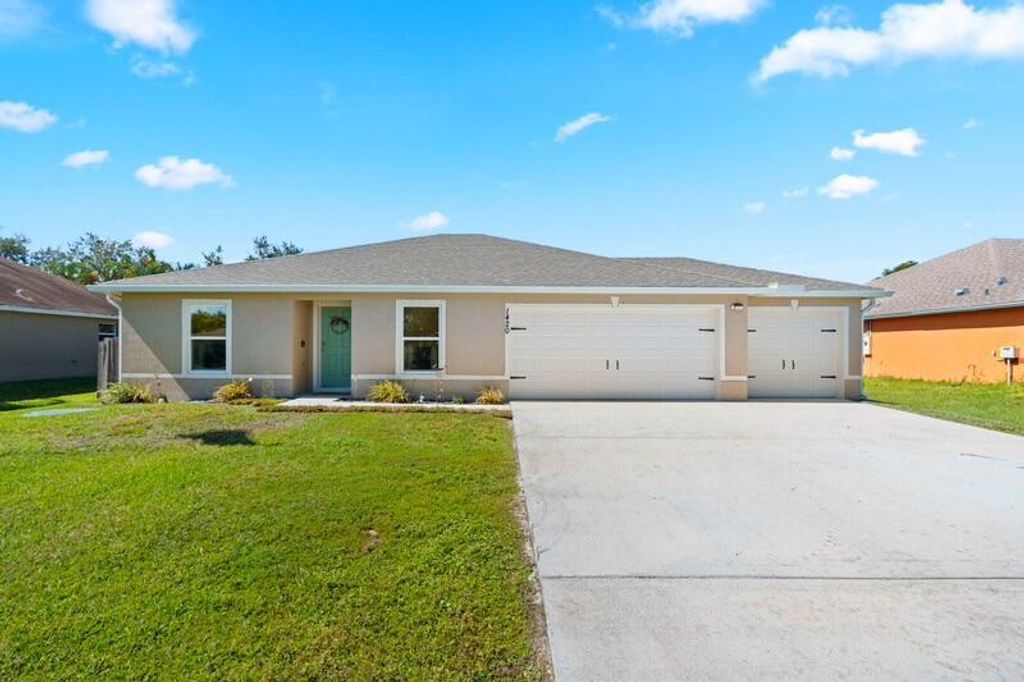 Photo of 1420 SE O'Donnell Lane, Port Saint Lucie, FL 34983 (MLS # R11133690)