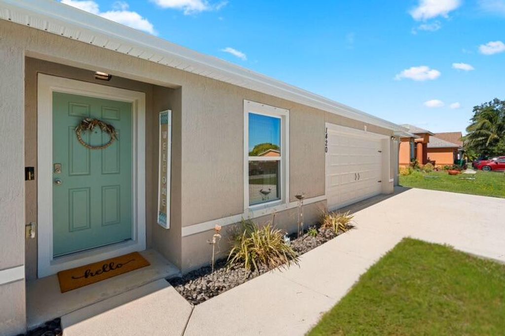 Photo of 1420 SE O'Donnell Lane, Port Saint Lucie, FL 34983 (MLS # R11133690)
