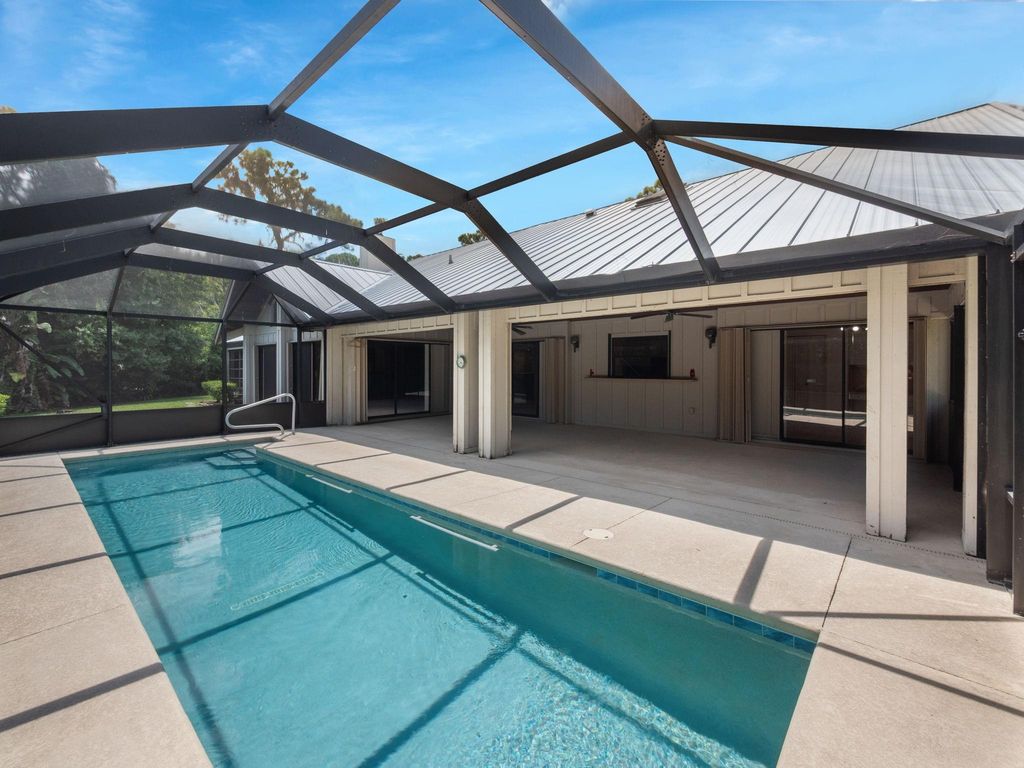 Photo of 2111 Racquet Club, Palm City, FL 34990 (MLS # F10519630)