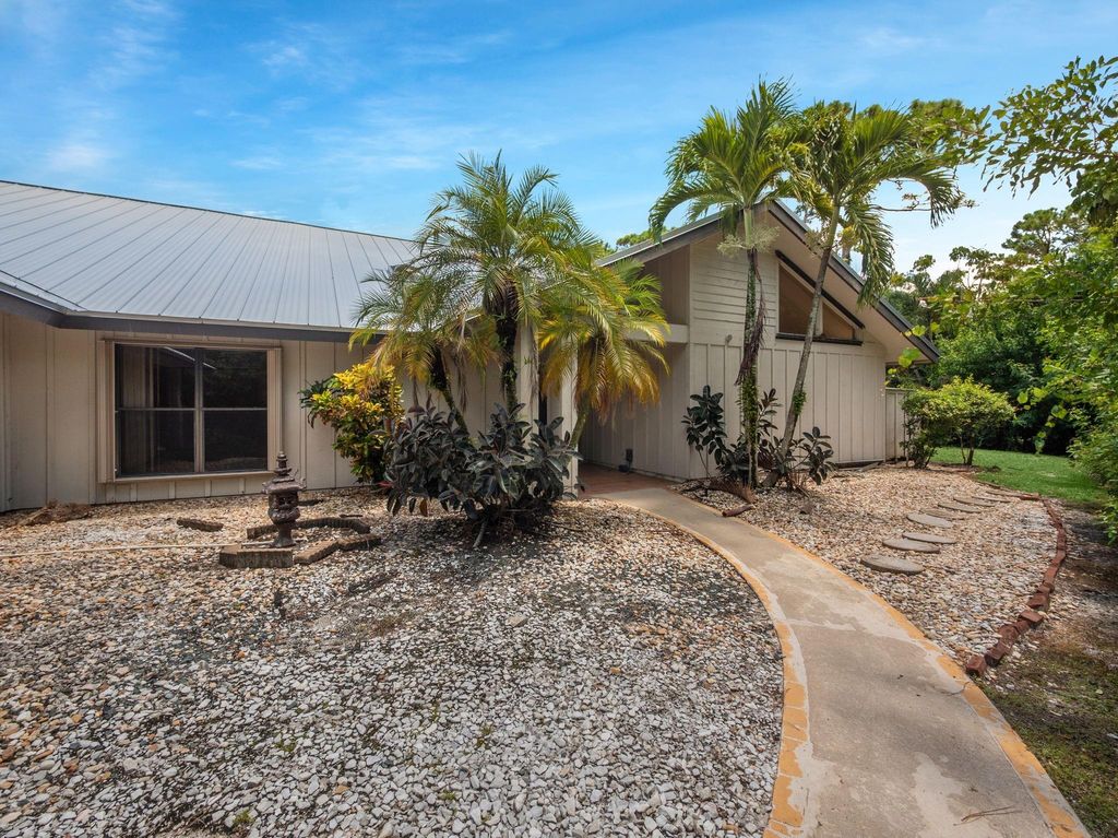 Photo of 2111 Racquet Club, Palm City, FL 34990 (MLS # F10519630)