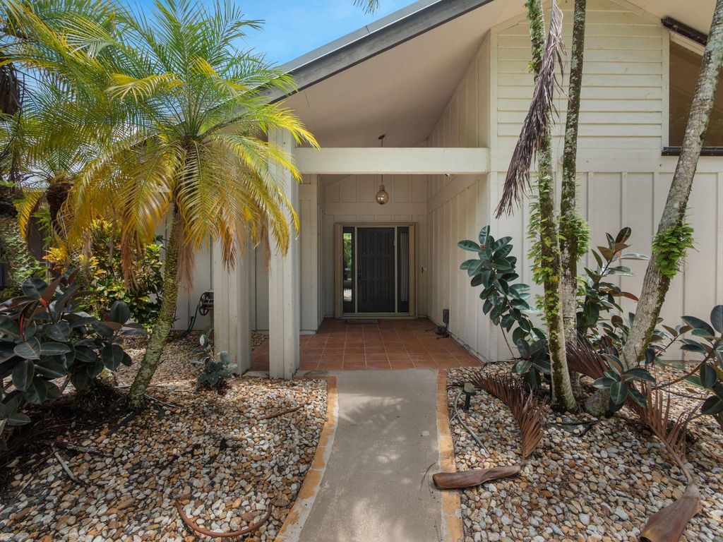 Photo of 2111 Racquet Club, Palm City, FL 34990 (MLS # F10519630)