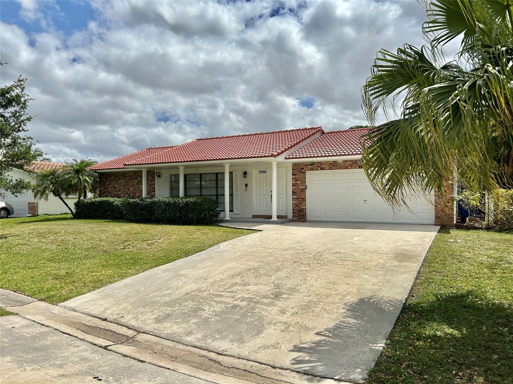 Photo of 12104 NW 29th Street, Coral Springs, FL 33065 (MLS # F10520343)
