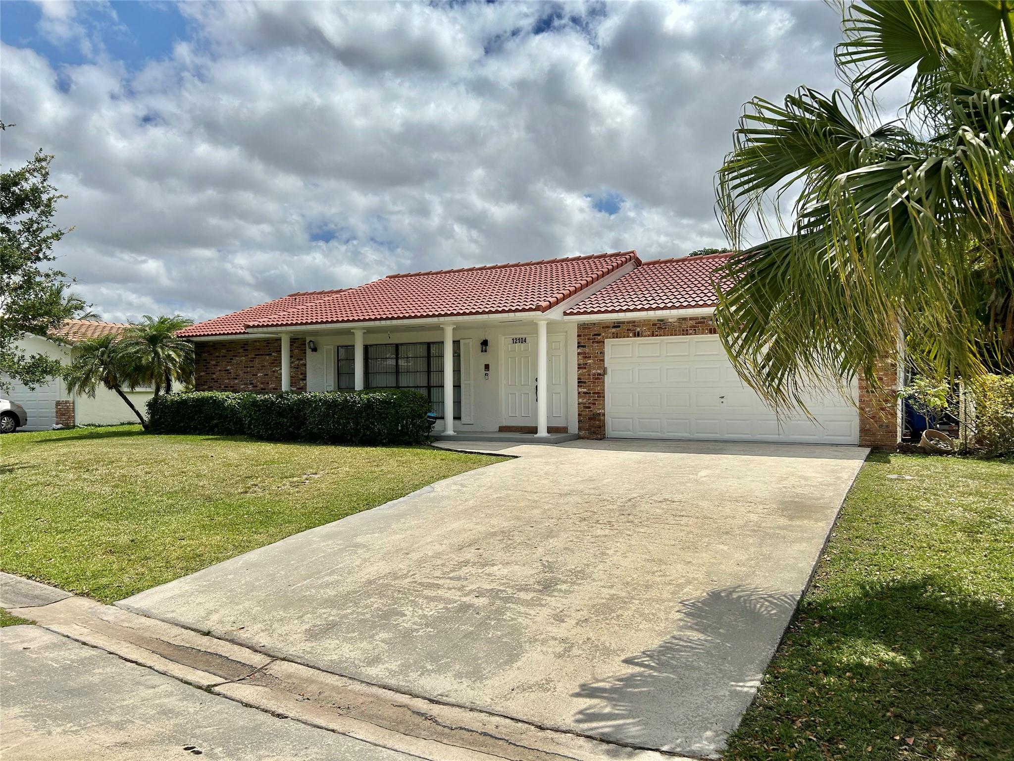 WOW! SUPER SPACIOUS HOME WITH A REALLY HUGE FAMILY ROOM. SPLIT PLAN DESIGN WITH GOOD SIZE BEDROOMS TOO. ALL 3 SCHOOLS ARE JUST BLOCKS AWAY AS WELL AS THE REGIONAL PARK WHICH INCLUDES A DOG PARK, AQUATIC CENTER, GYM, TENNIS CENTER, A NATURE CENTER, AND ICE RINK. SAWGRASS EXPRESSWAY IS JUST MINUTES AWAY TOO FOR EZ ACCESS TO MIAMI AND PALM BEACH COUNTY. THE HOME IS LOCATED ON A LARGE CORNER LOT AND IS ON A DEAD END STREET. YOU WILL LOVE THE ALMOST NEW KITCHEN WITH LIKE NEW APPLIANCES TOO. ALL NEUTRAL TILE & LAMINATE FLOORING. OWNER MAY CONSIDER PETS WITH DEPOSIT. YOU WILL LOVE BEING A PART OF ONE OF CORAL SPRINGS NICEST SUBDIVISIONS!