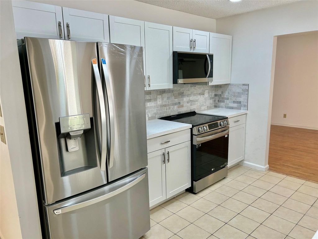 Photo of 12104 NW 29th Street, Coral Springs, FL 33065 (MLS # F10520343)