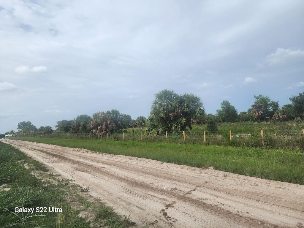 Photo of 6746 Dennis Street, Loxahatchee, FL 33470 (MLS # R11097203)
